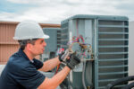 Man working on A/C Unit