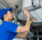 A/C Professional inspects ventilation system